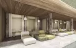 Spa relaxation area with day beds and tree-trunk pillars at Barma, Courchevel La Tania