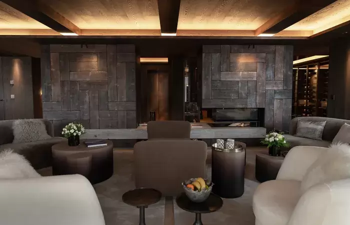 The living room with sofas and a fireplace at No. 14 Verbier